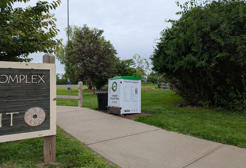 Food scrap bin with foot pedal